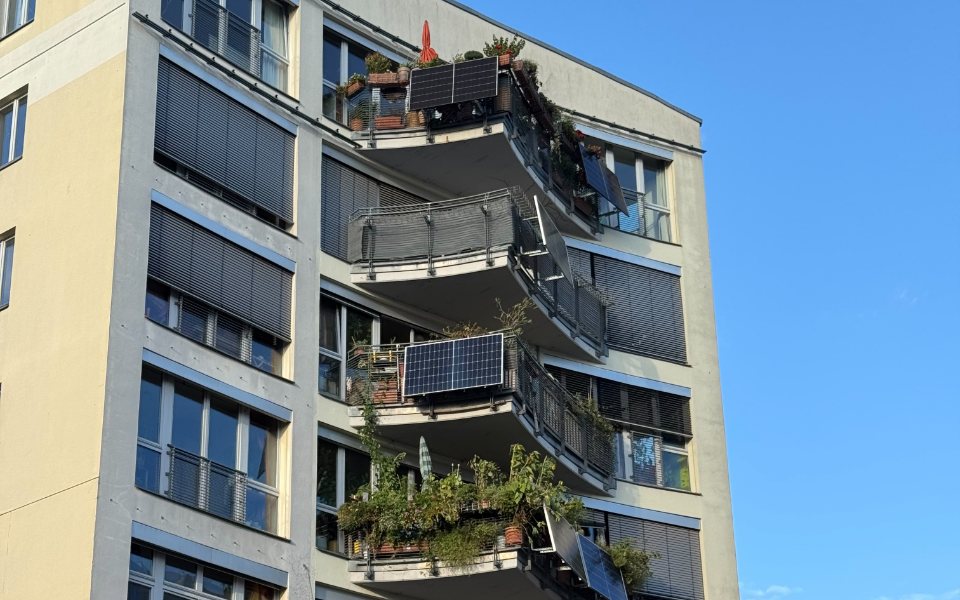 Plug-in solar panels fixed to the balconies of a block of flats